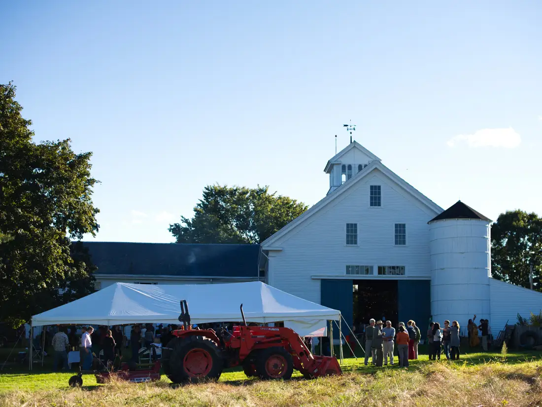 Outdoor gathering at a farm to enjoy local cuisine. 